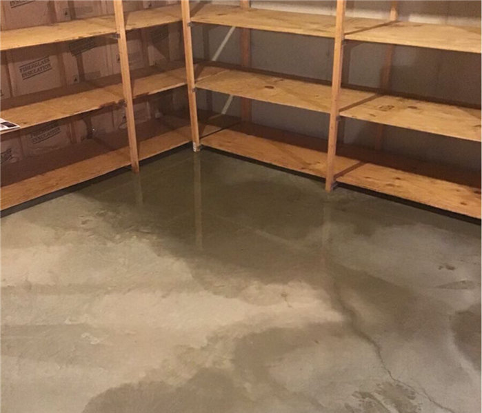 Empty Basement with a .5" of standing water.