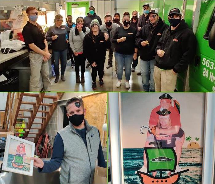 A group picture of employees wearing face masks and eye patches.